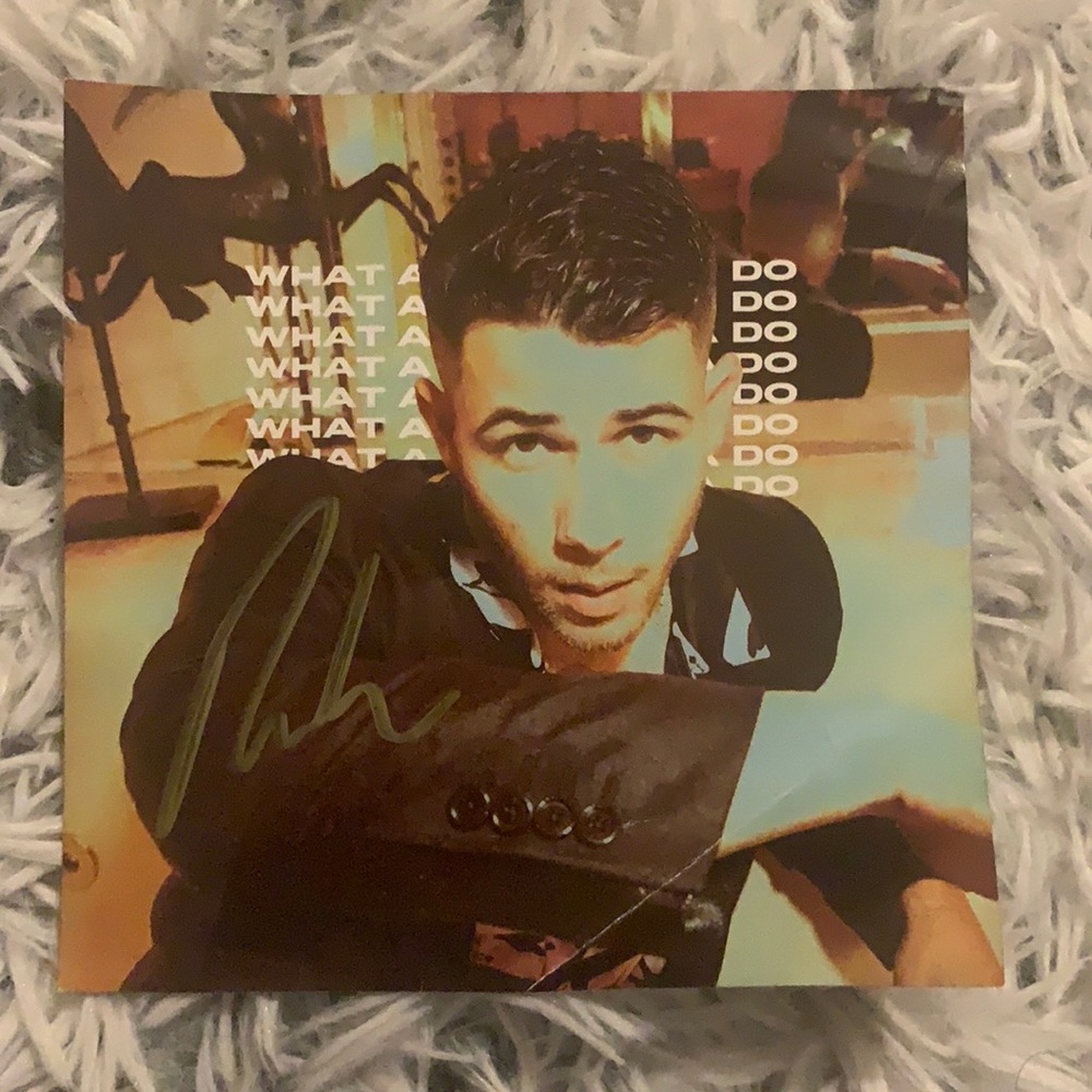 Signed Nick Jonas Card, what a man gotta do. Bent